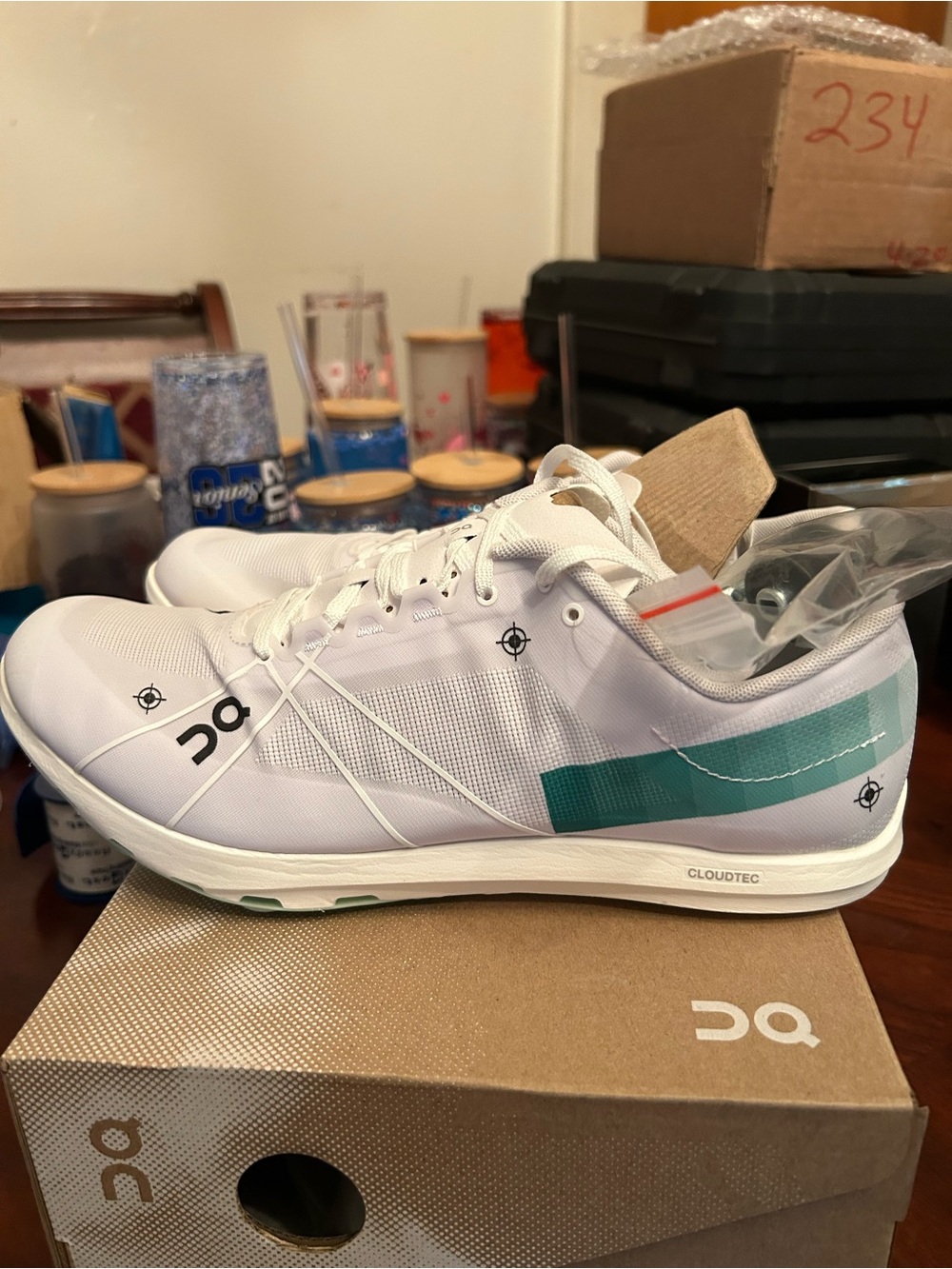 On Running Men’s White Golf Shoes with Green Stripe